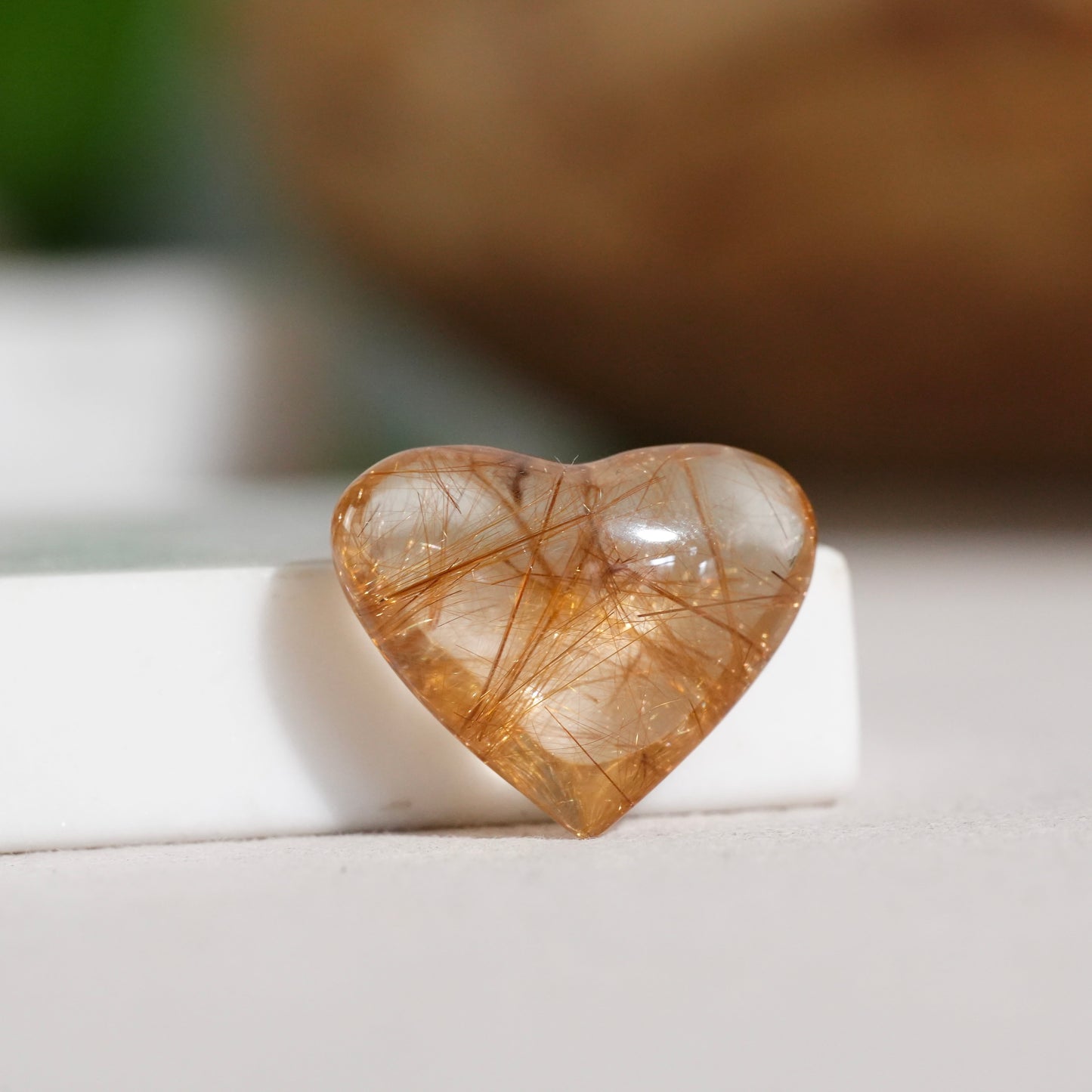 Silver rutilated quartz point