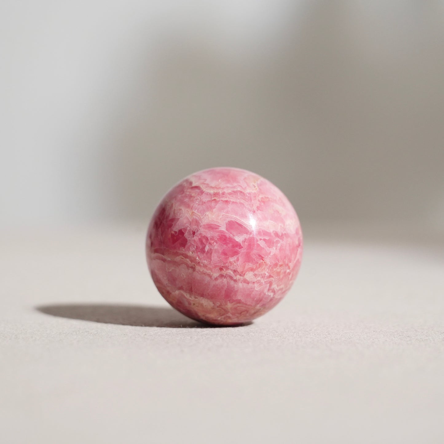 Peruvian rhodochrosite sphere