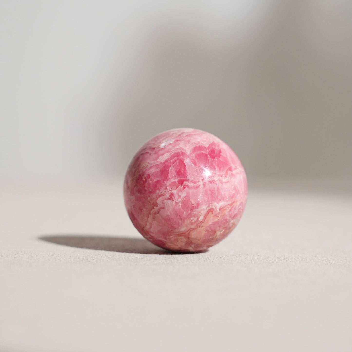 Peruvian rhodochrosite sphere