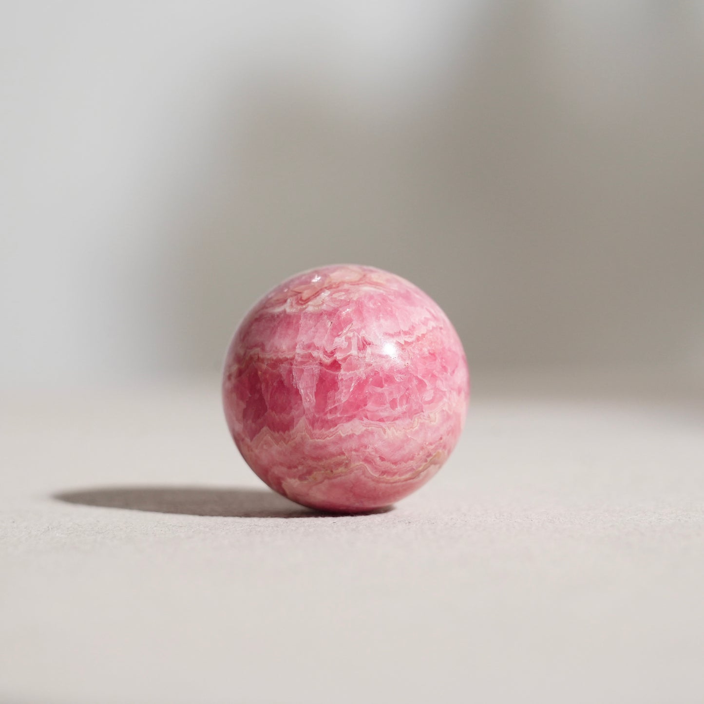 Peruvian rhodochrosite sphere