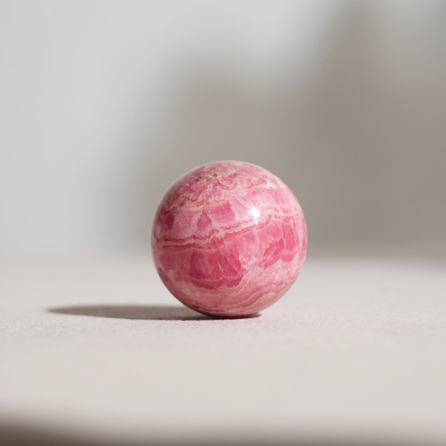 Peruvian rhodochrosite sphere