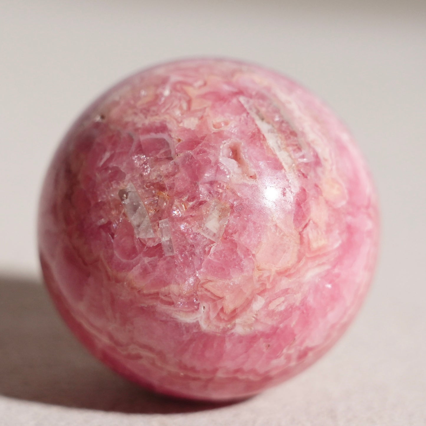Peruvian rhodochrosite sphere
