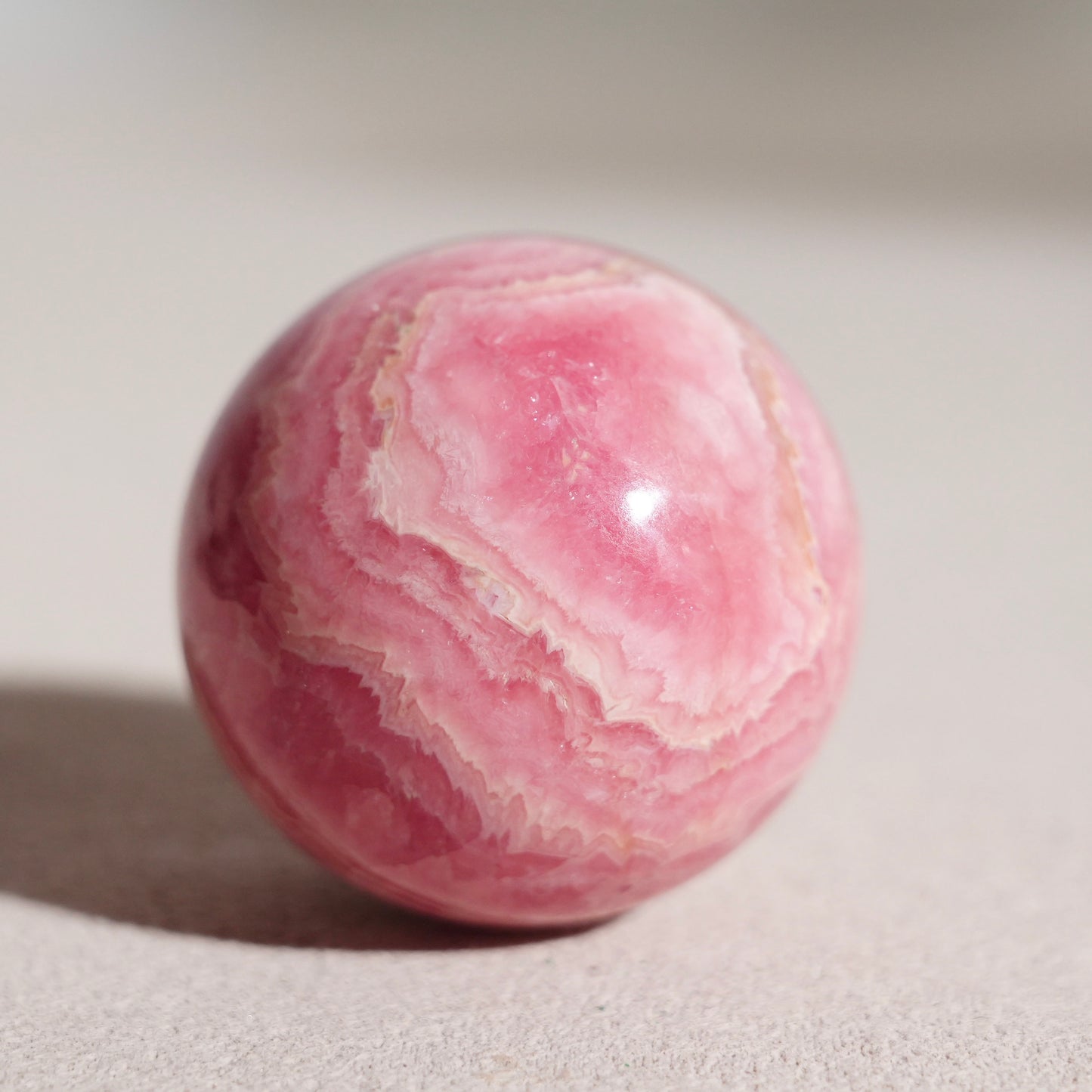 Peruvian rhodochrosite sphere
