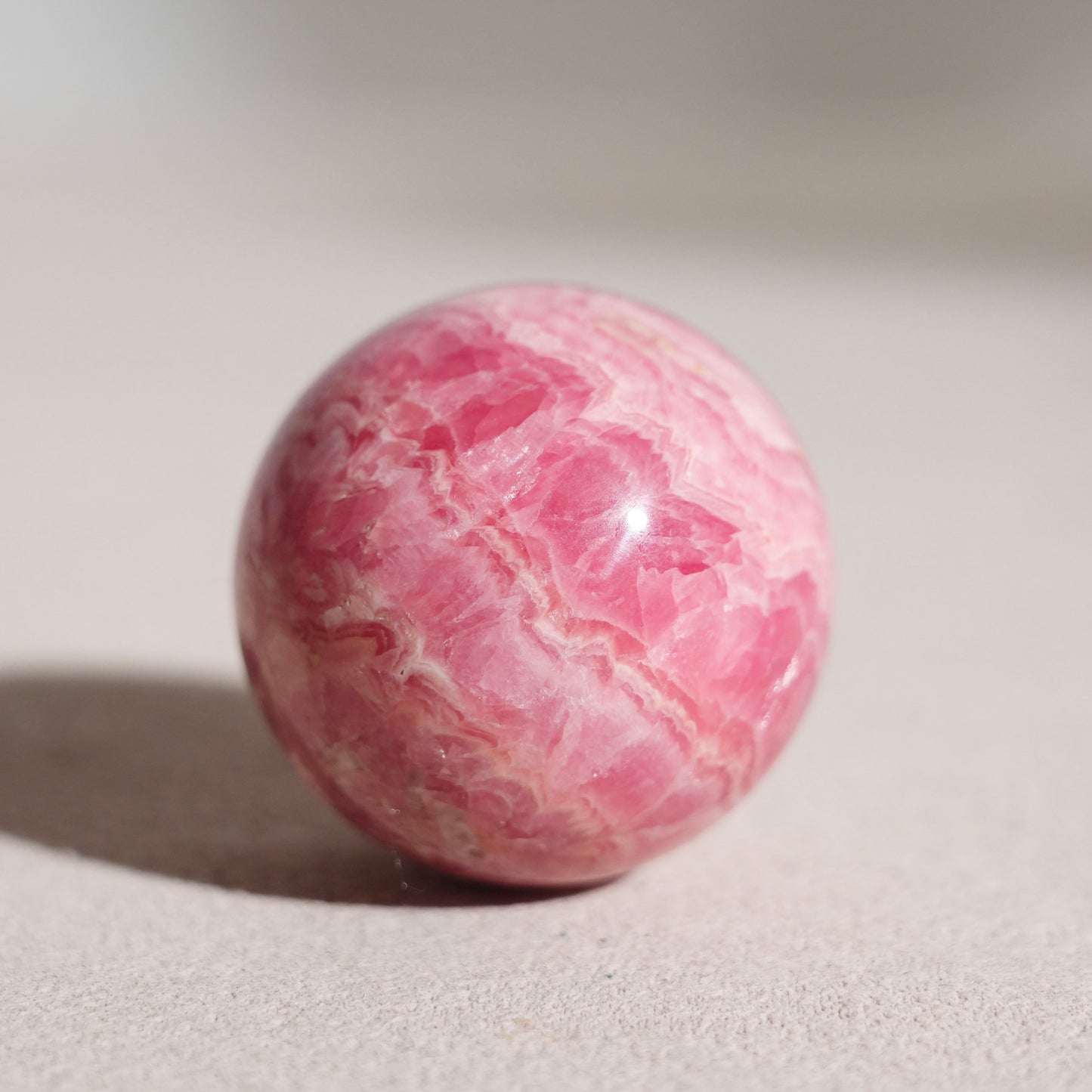 Peruvian rhodochrosite sphere
