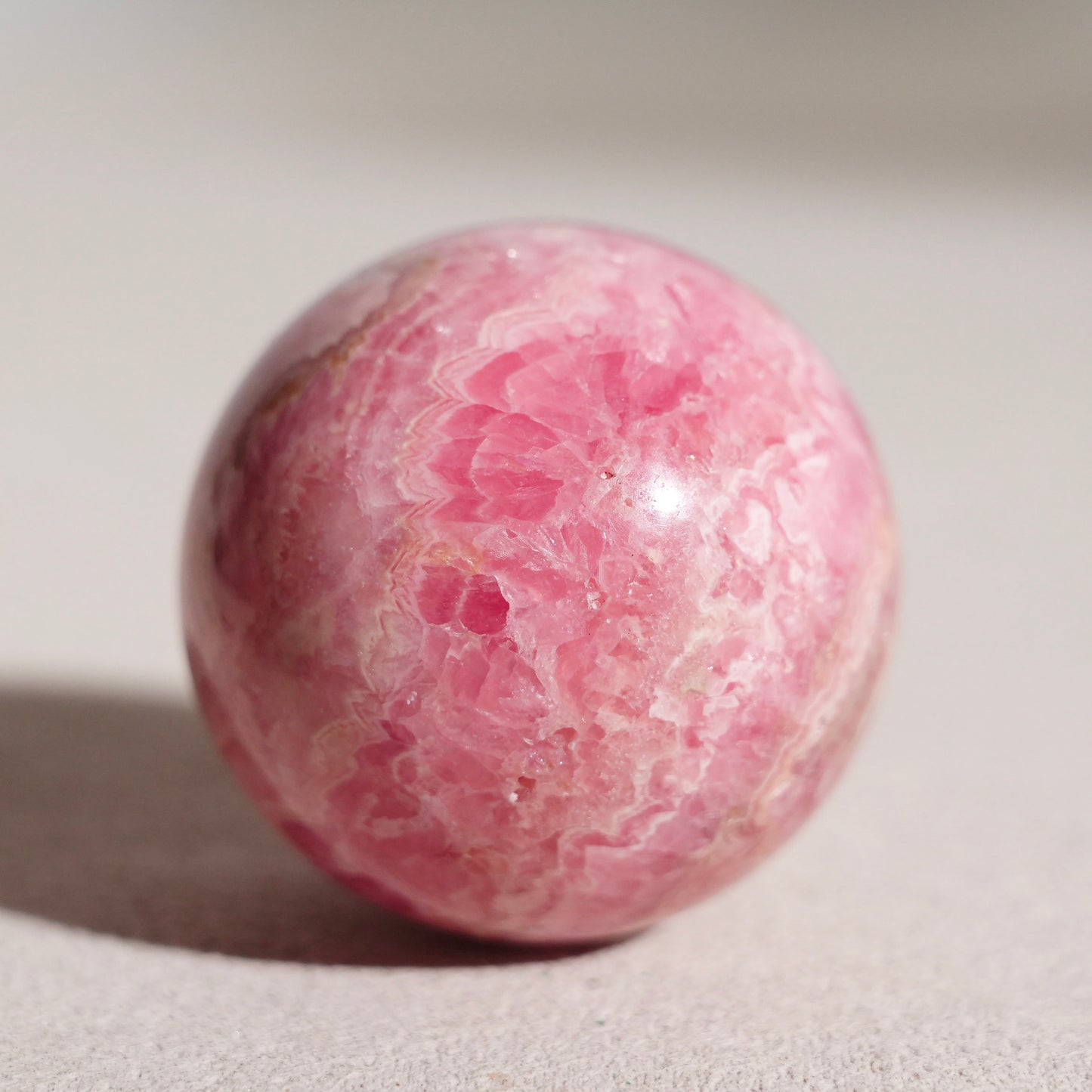 Peruvian rhodochrosite sphere