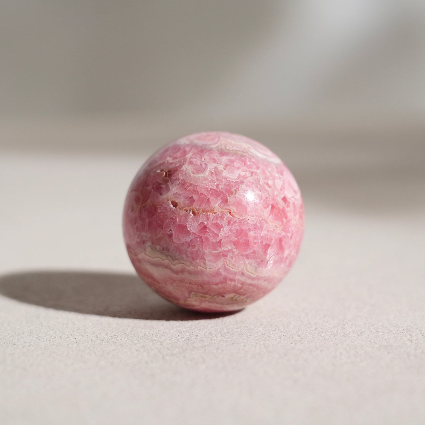 Peruvian rhodochrosite sphere
