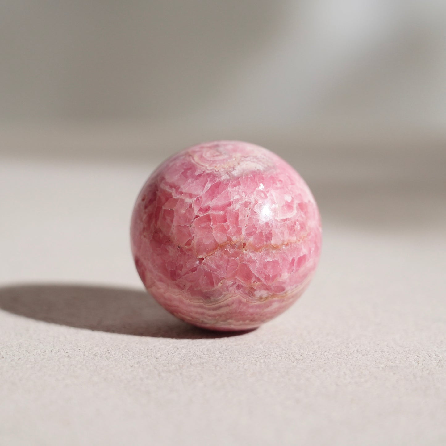 Peruvian rhodochrosite sphere
