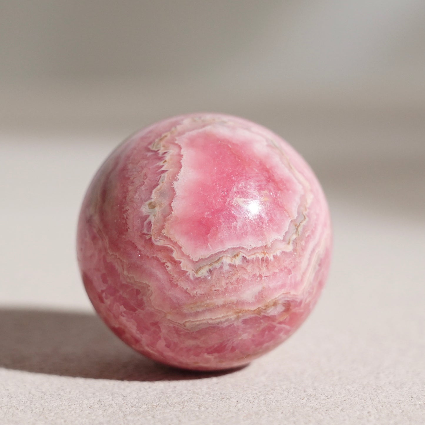 Peruvian rhodochrosite sphere