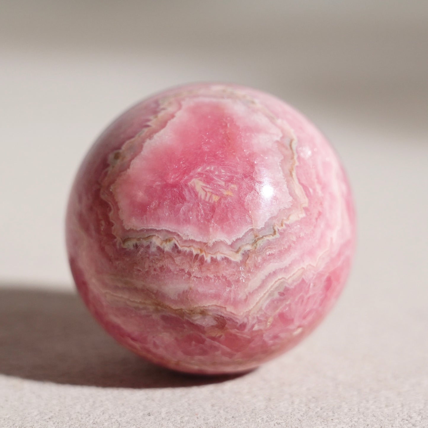 Peruvian rhodochrosite sphere