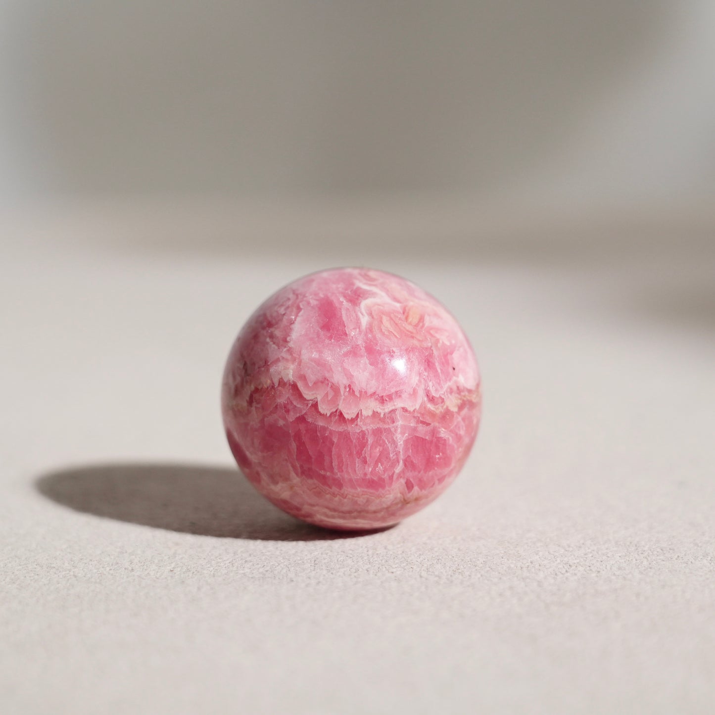 Peruvian rhodochrosite sphere