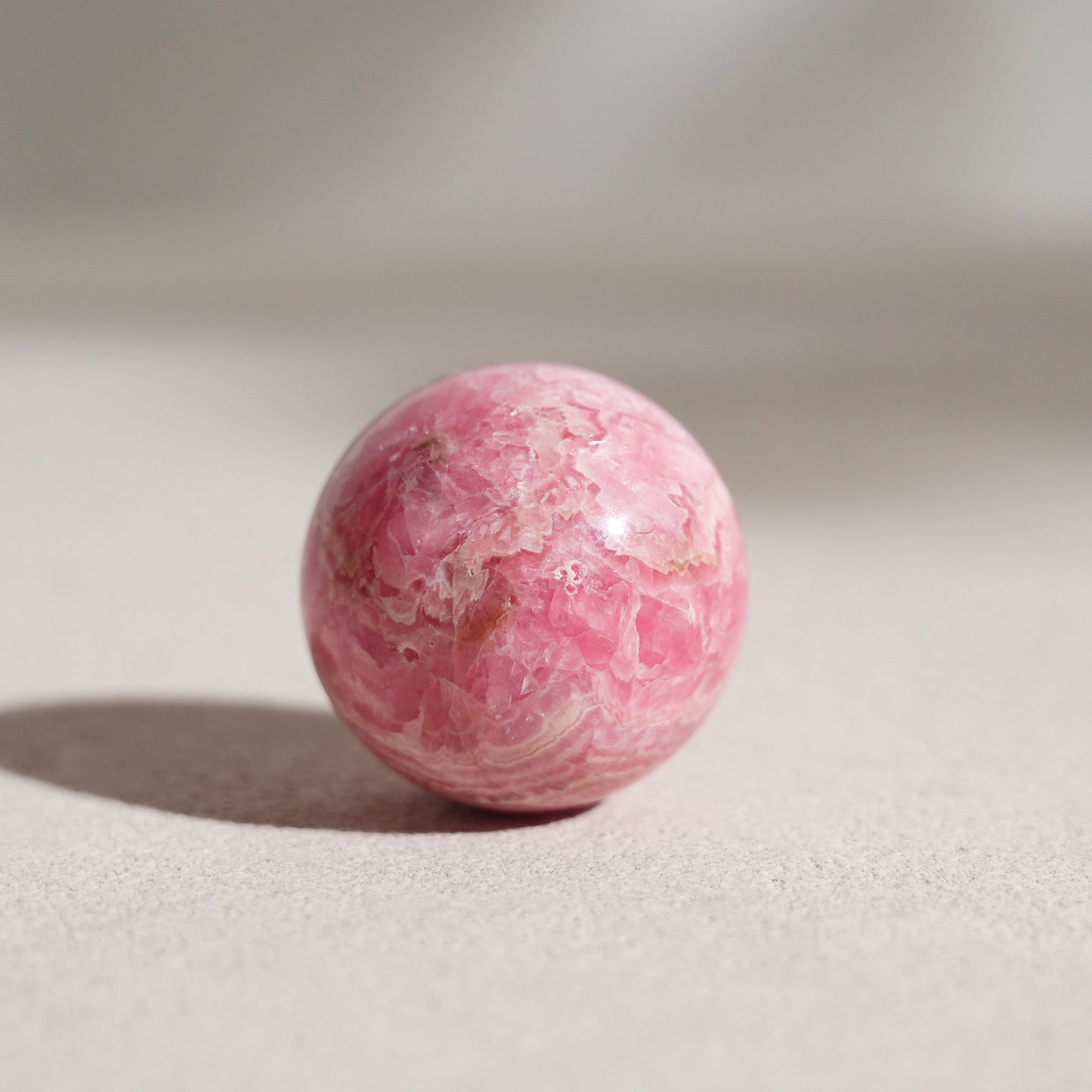 Peruvian rhodochrosite sphere