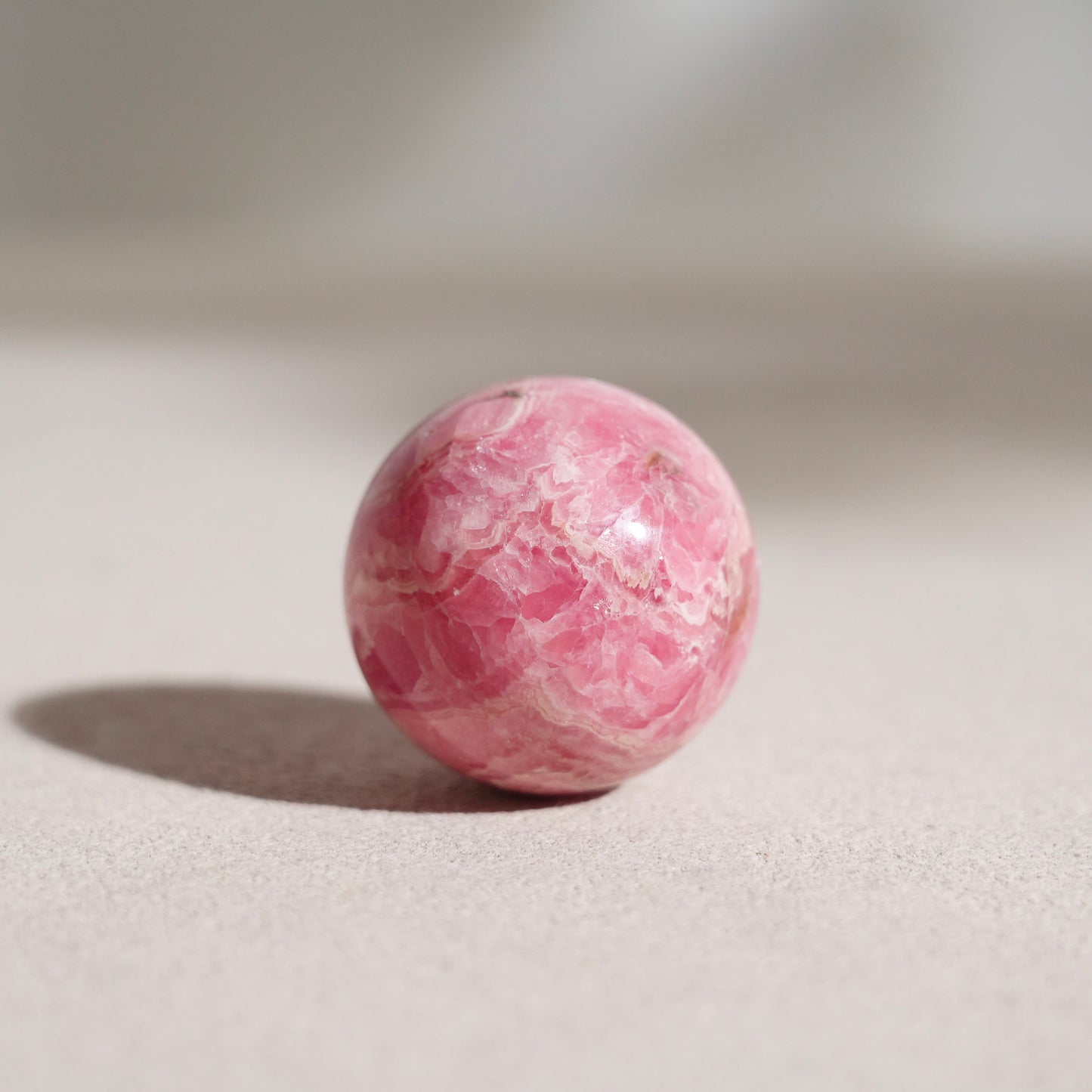 Peruvian rhodochrosite sphere