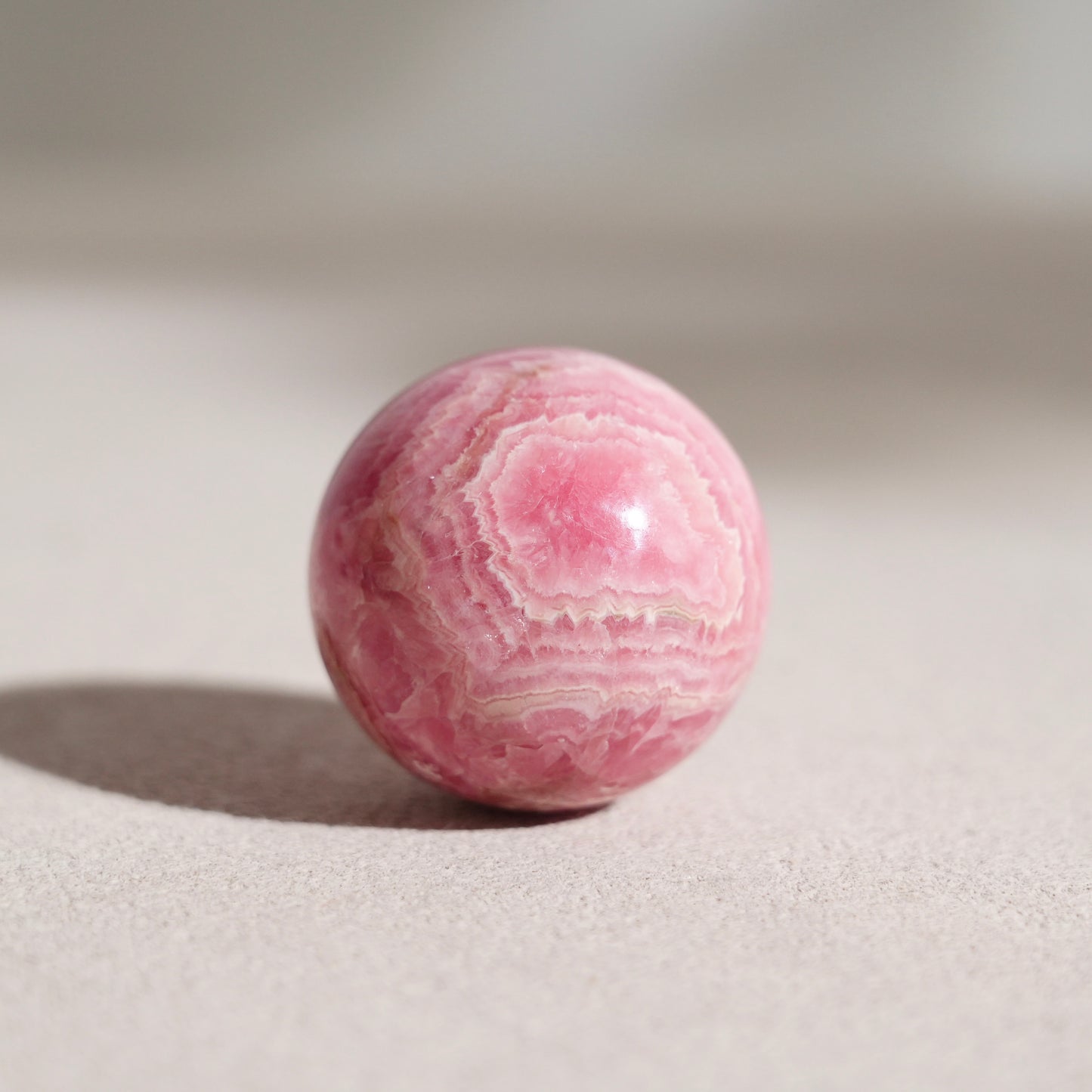 Peruvian rhodochrosite sphere