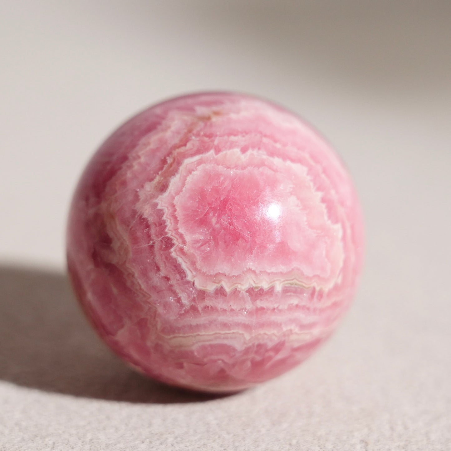Peruvian rhodochrosite sphere