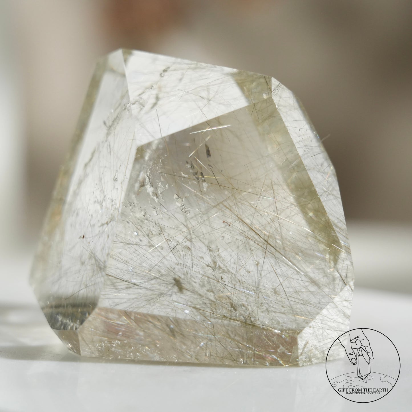 Green rutilated quartz sphere