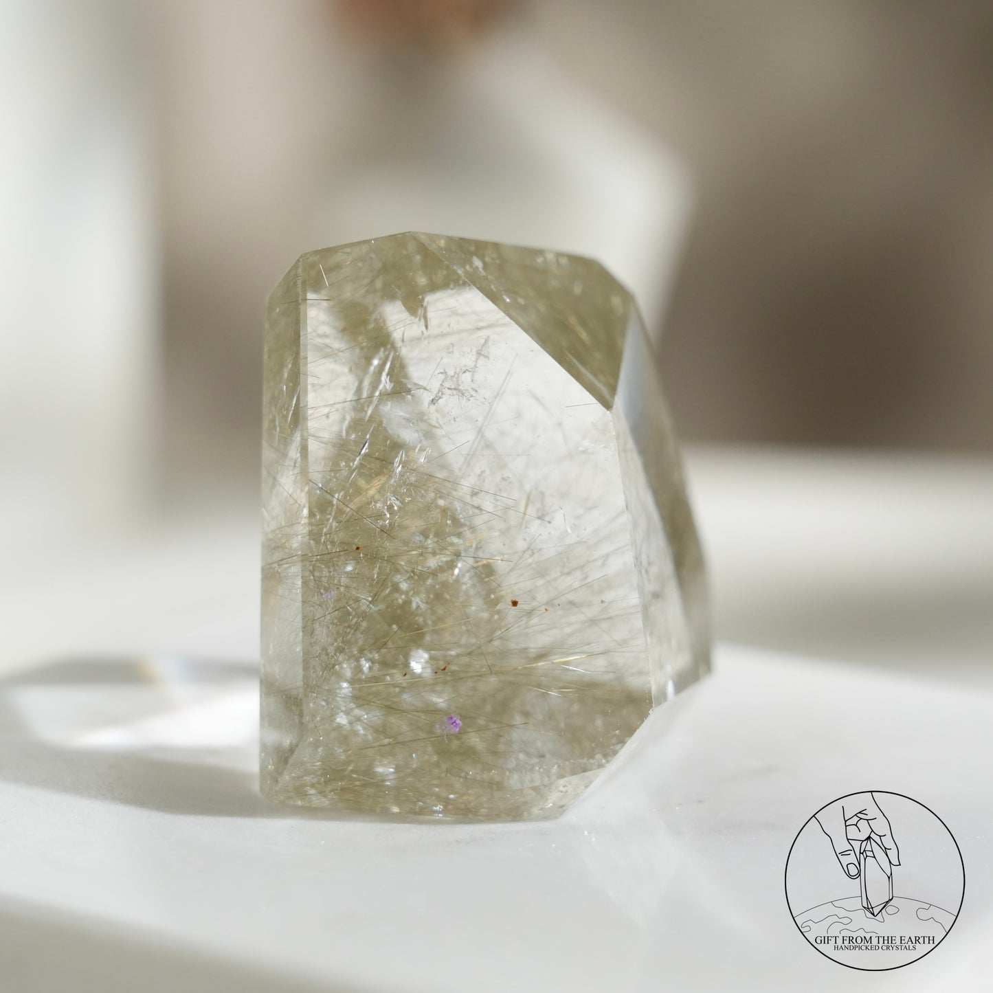 Green rutilated quartz sphere