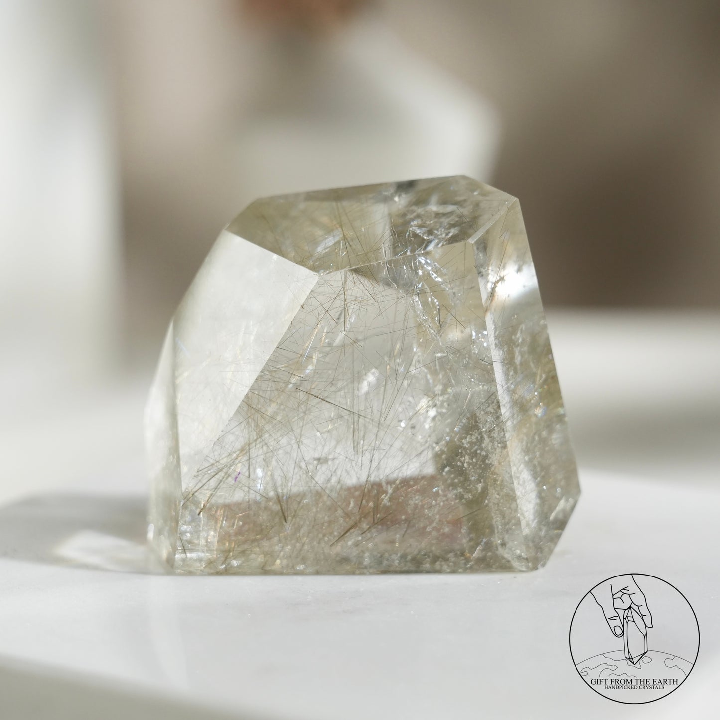 Green rutilated quartz sphere