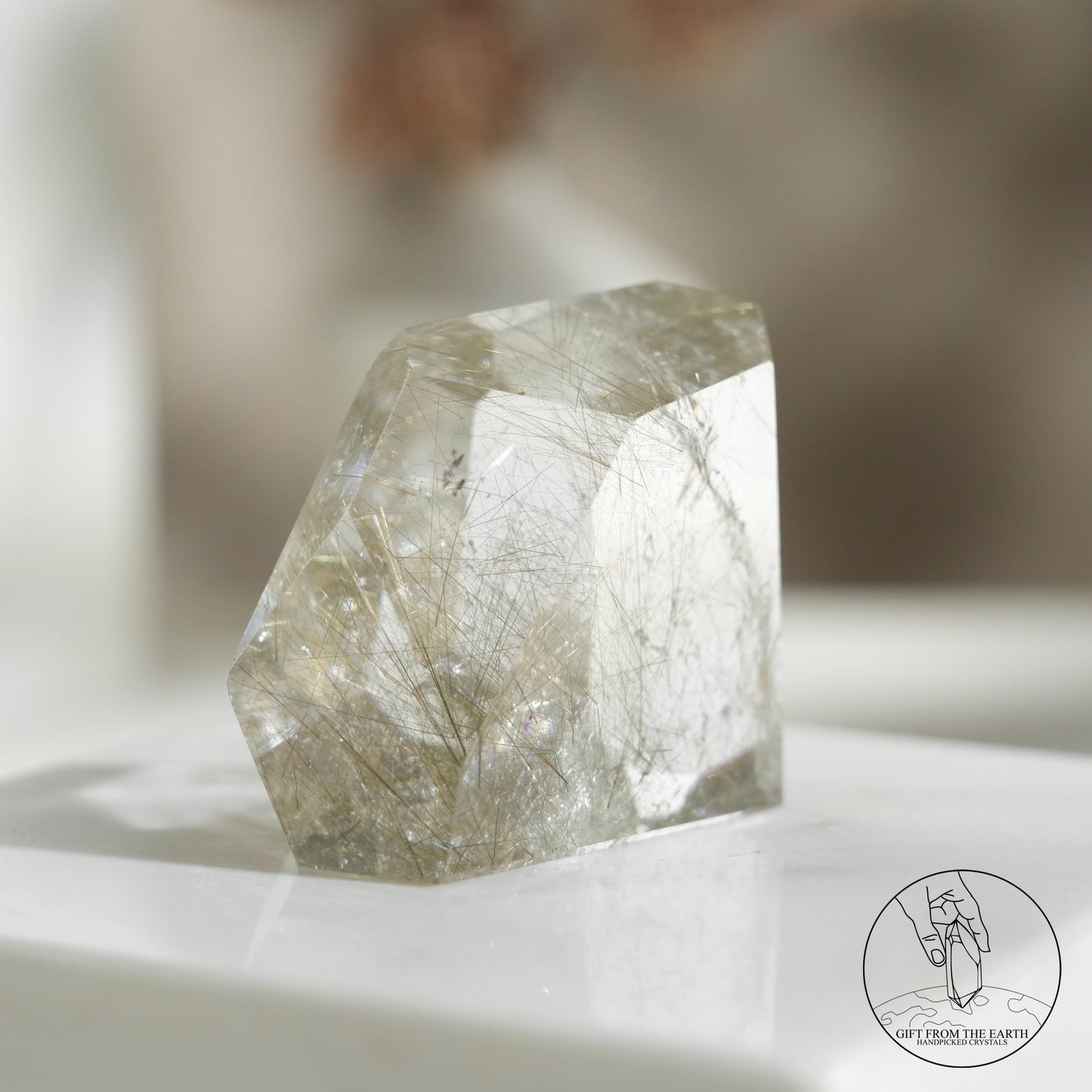 Green rutilated quartz sphere