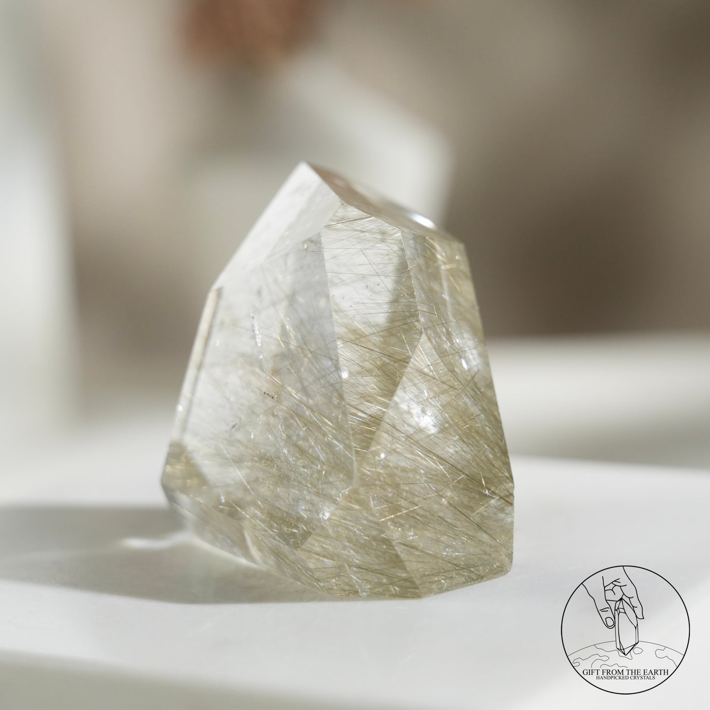 Green rutilated quartz sphere