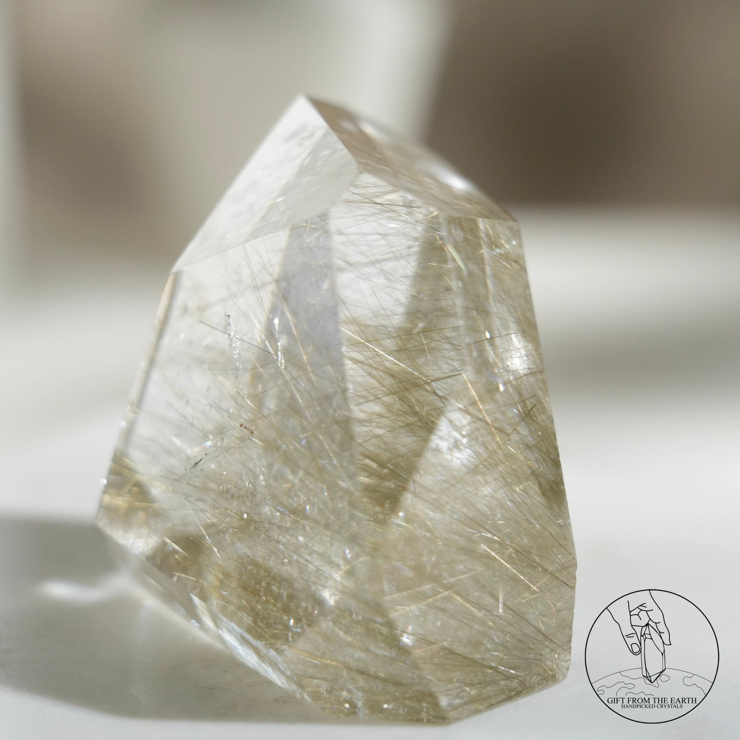 Green rutilated quartz sphere