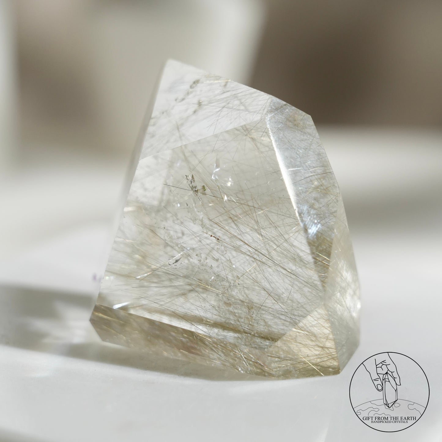 Green rutilated quartz sphere