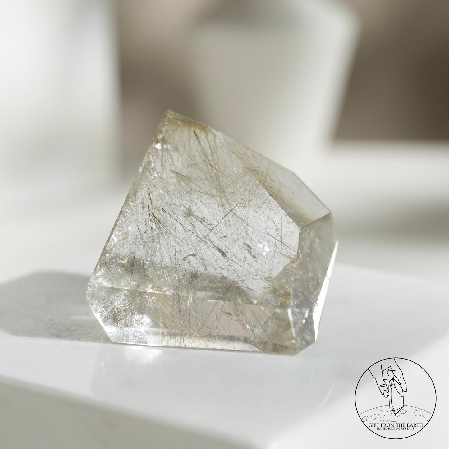 Green rutilated quartz sphere