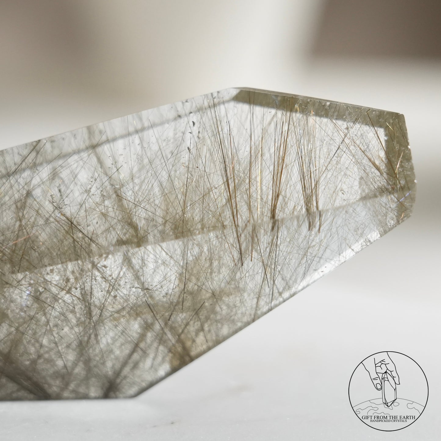 Green rutilated quartz sphere