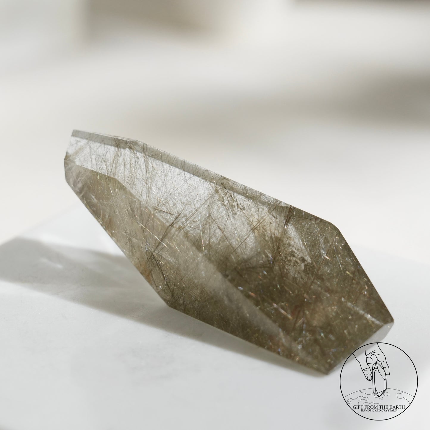 Green rutilated quartz sphere