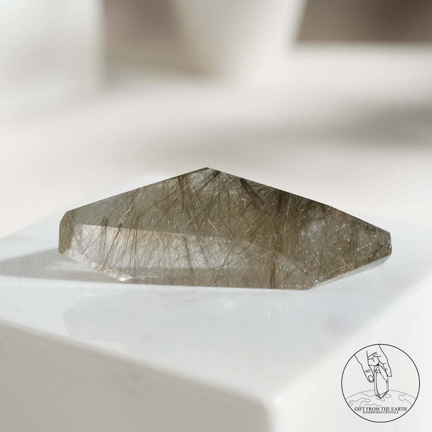 Green rutilated quartz sphere