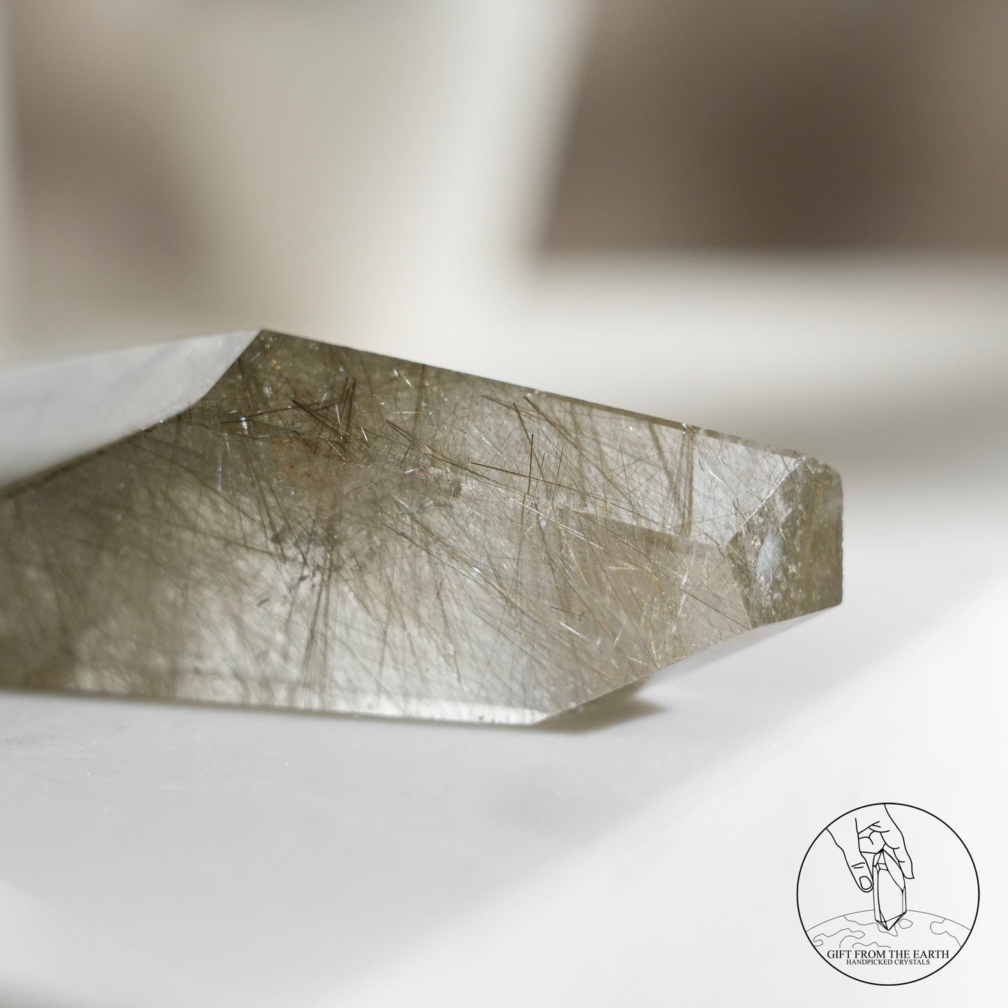 Green rutilated quartz sphere