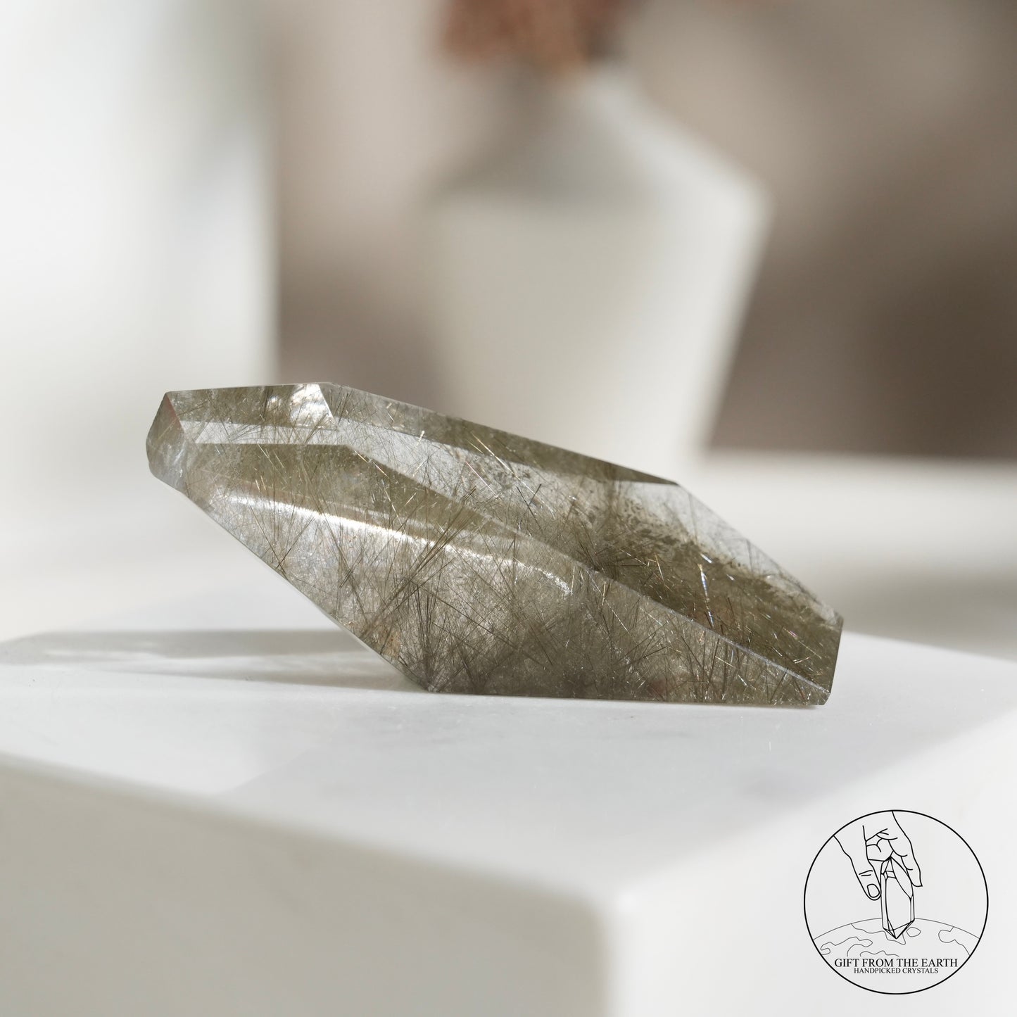 Green rutilated quartz sphere