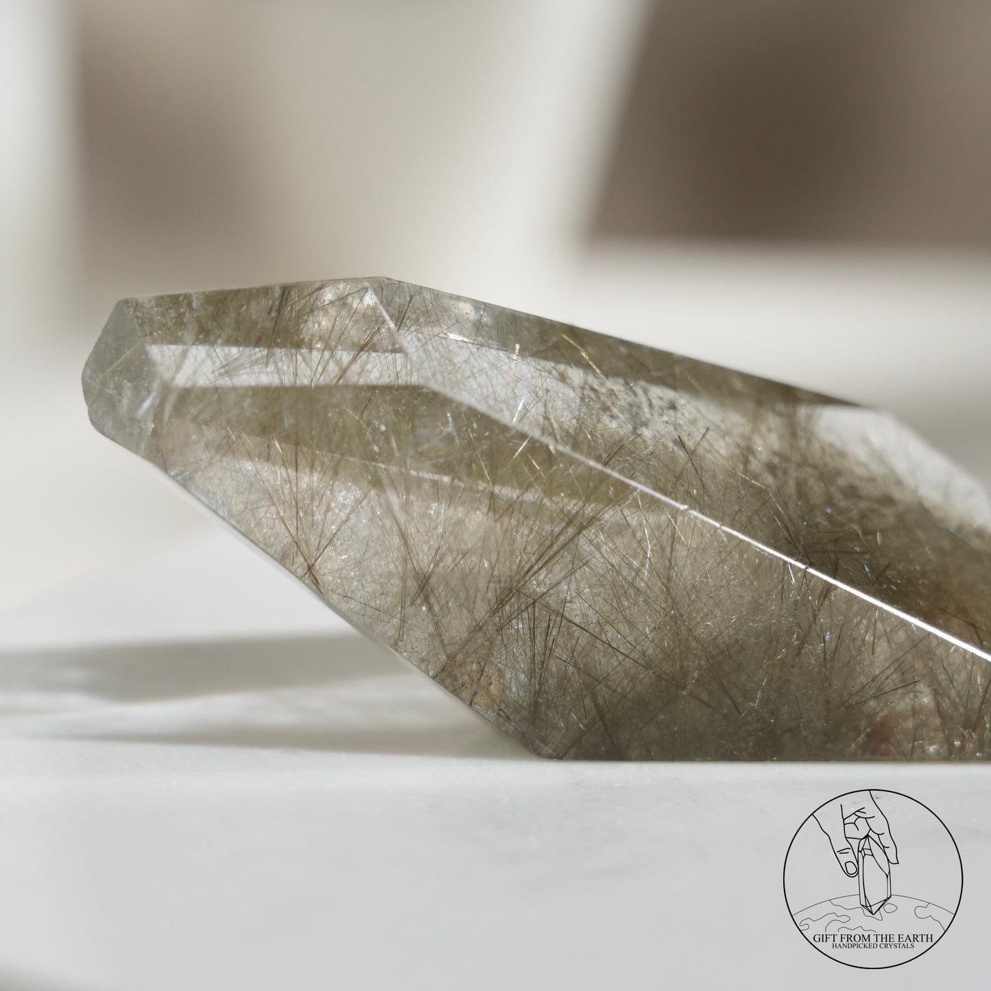 Green rutilated quartz sphere