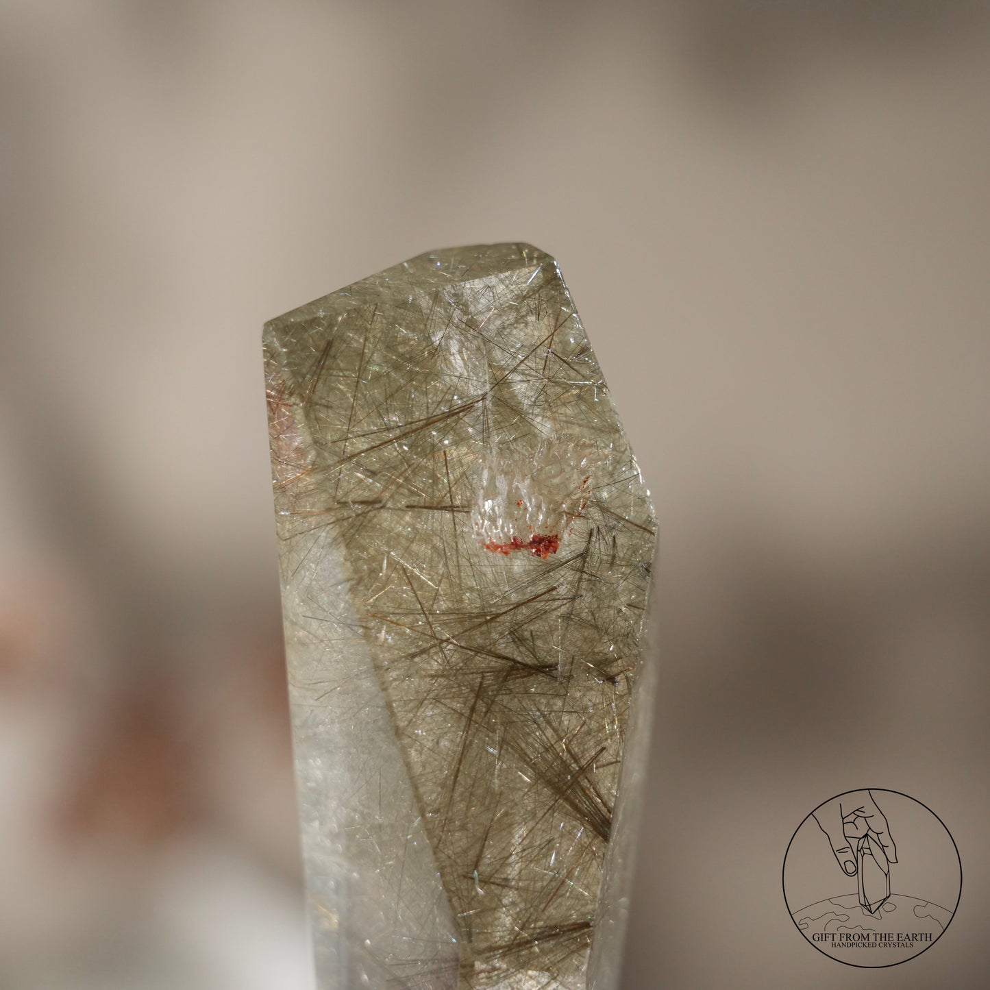 Green rutilated quartz sphere