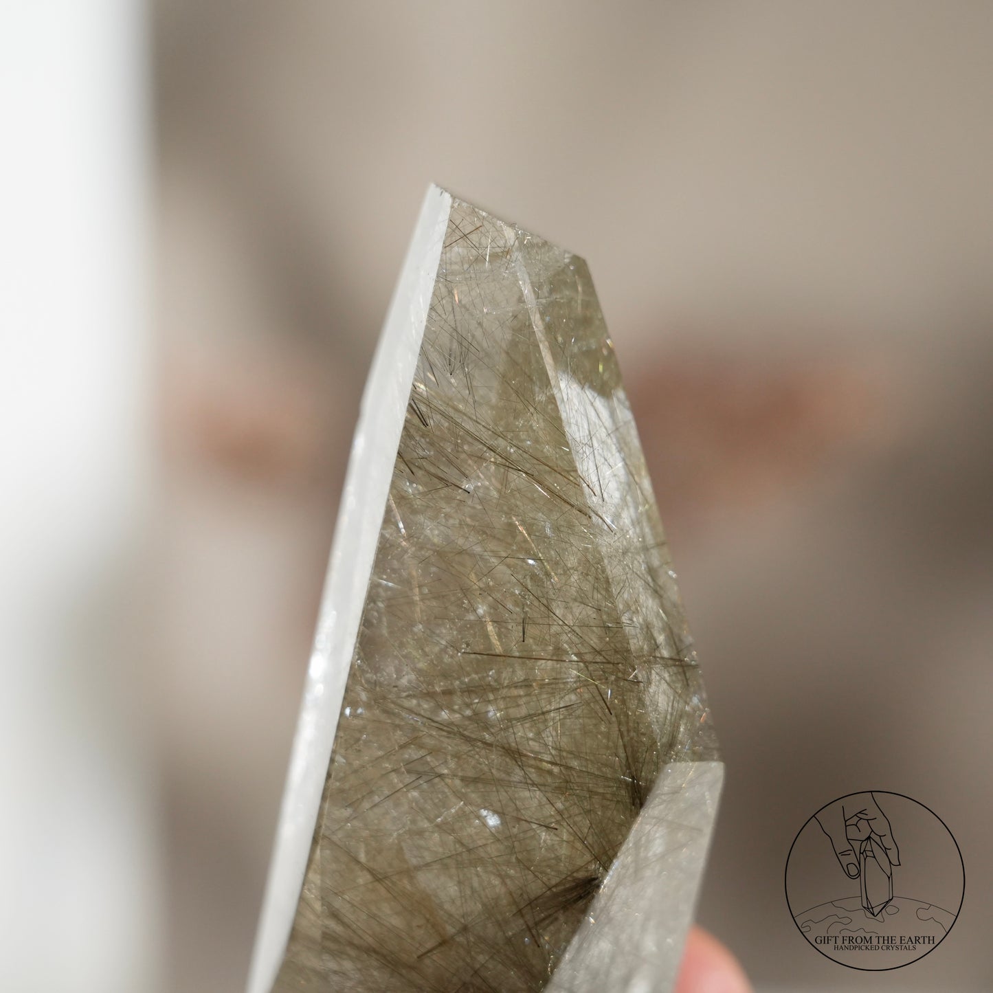 Green rutilated quartz sphere