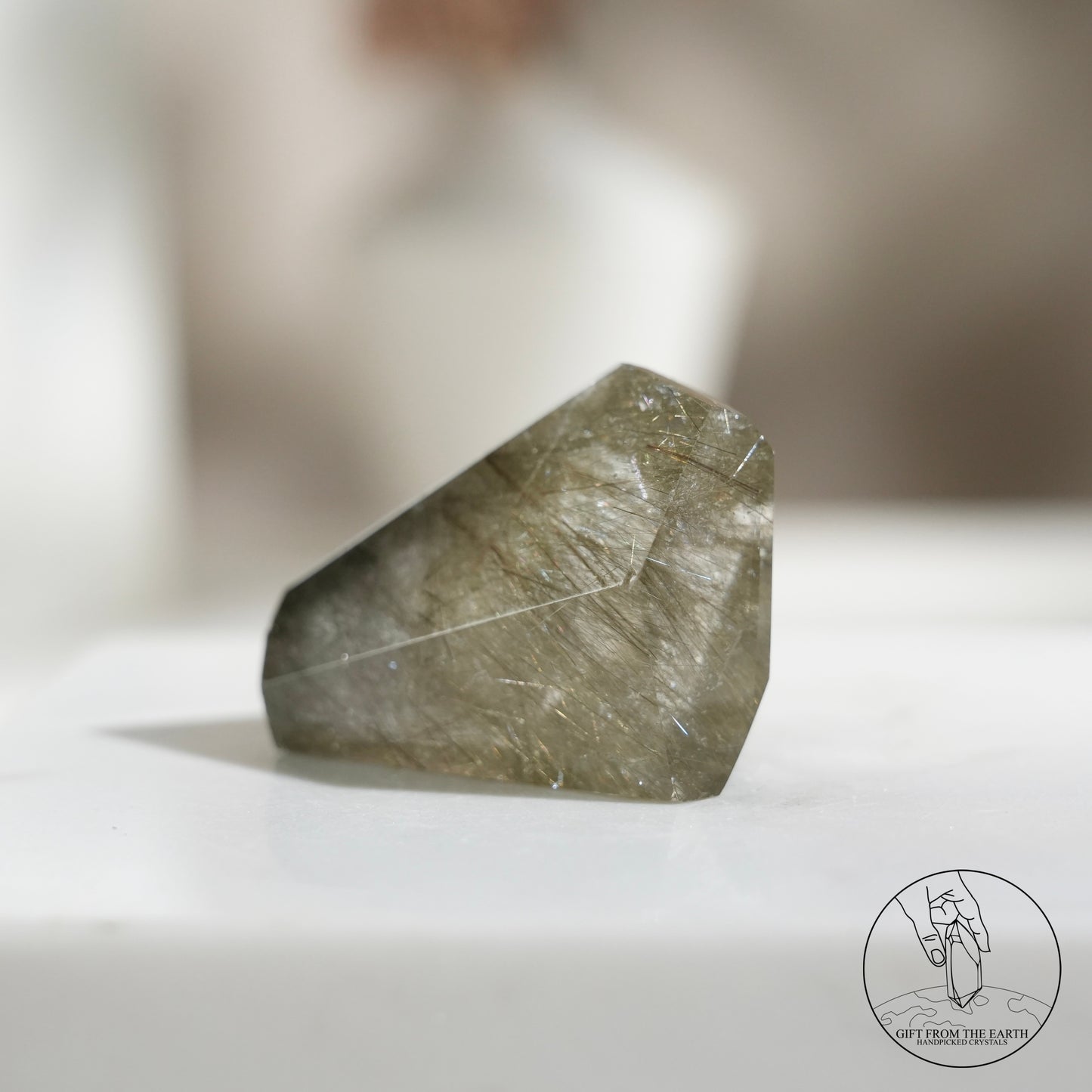 Green rutilated quartz sphere