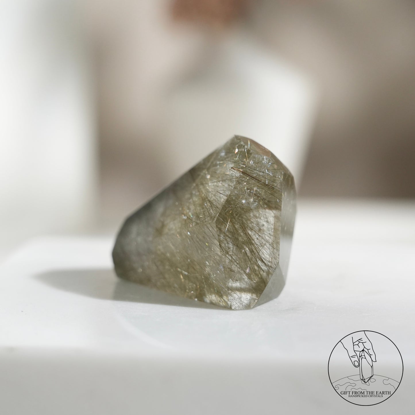 Green rutilated quartz sphere