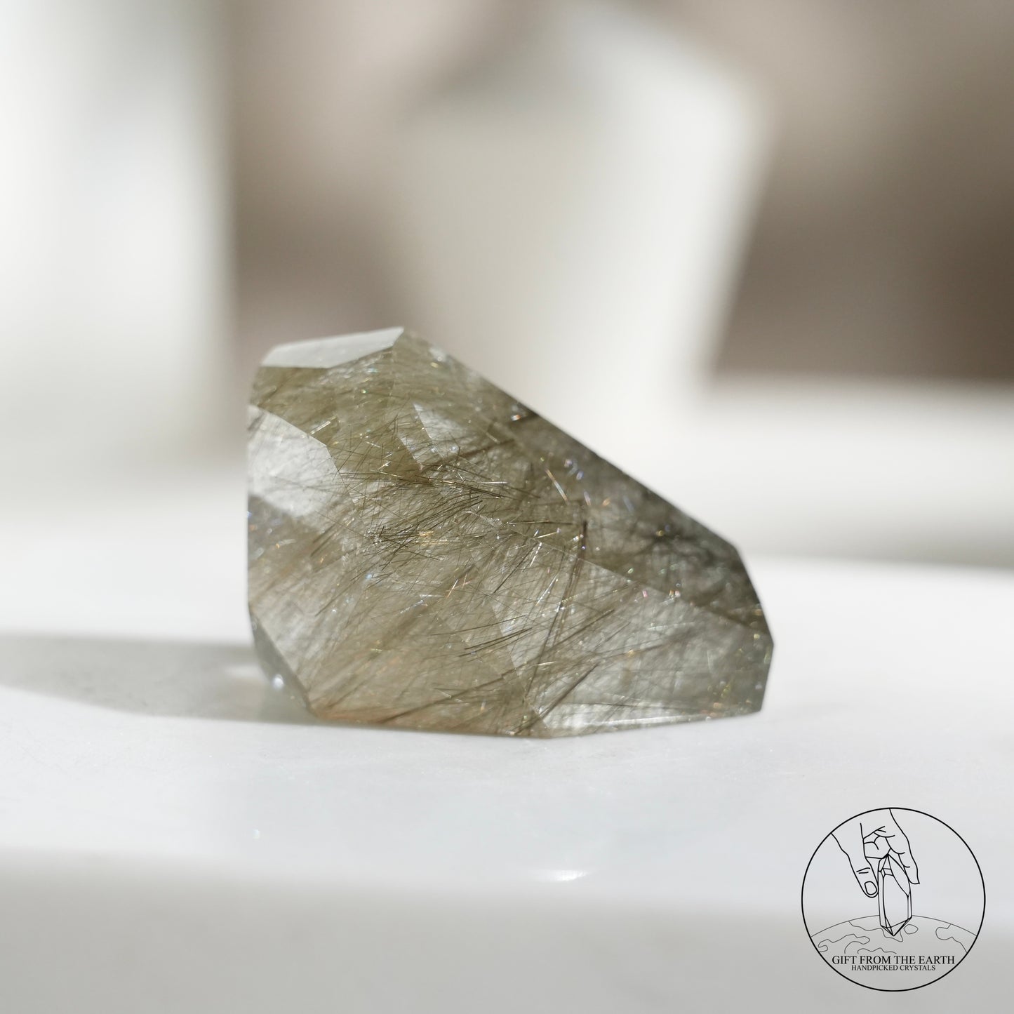Green rutilated quartz sphere