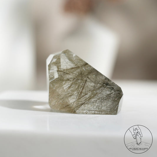 Green rutilated quartz sphere