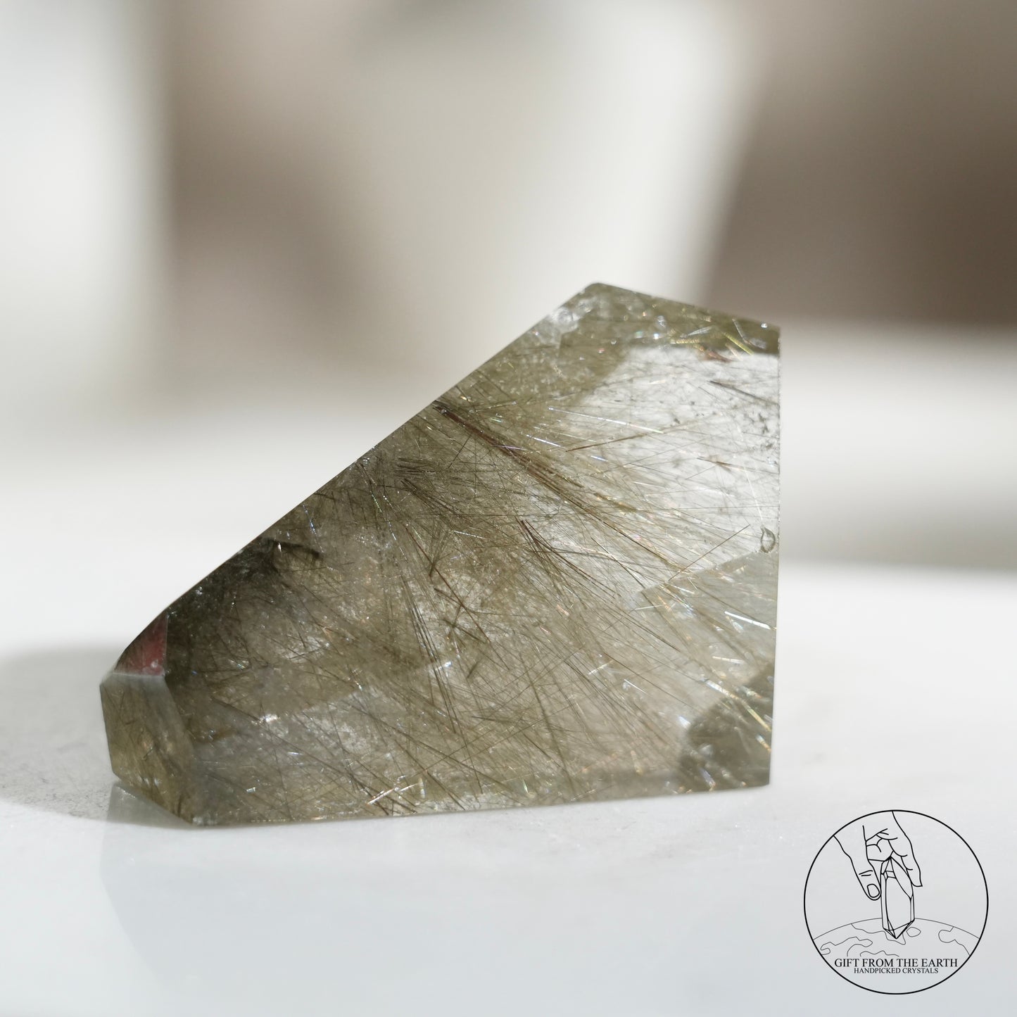 Green rutilated quartz sphere