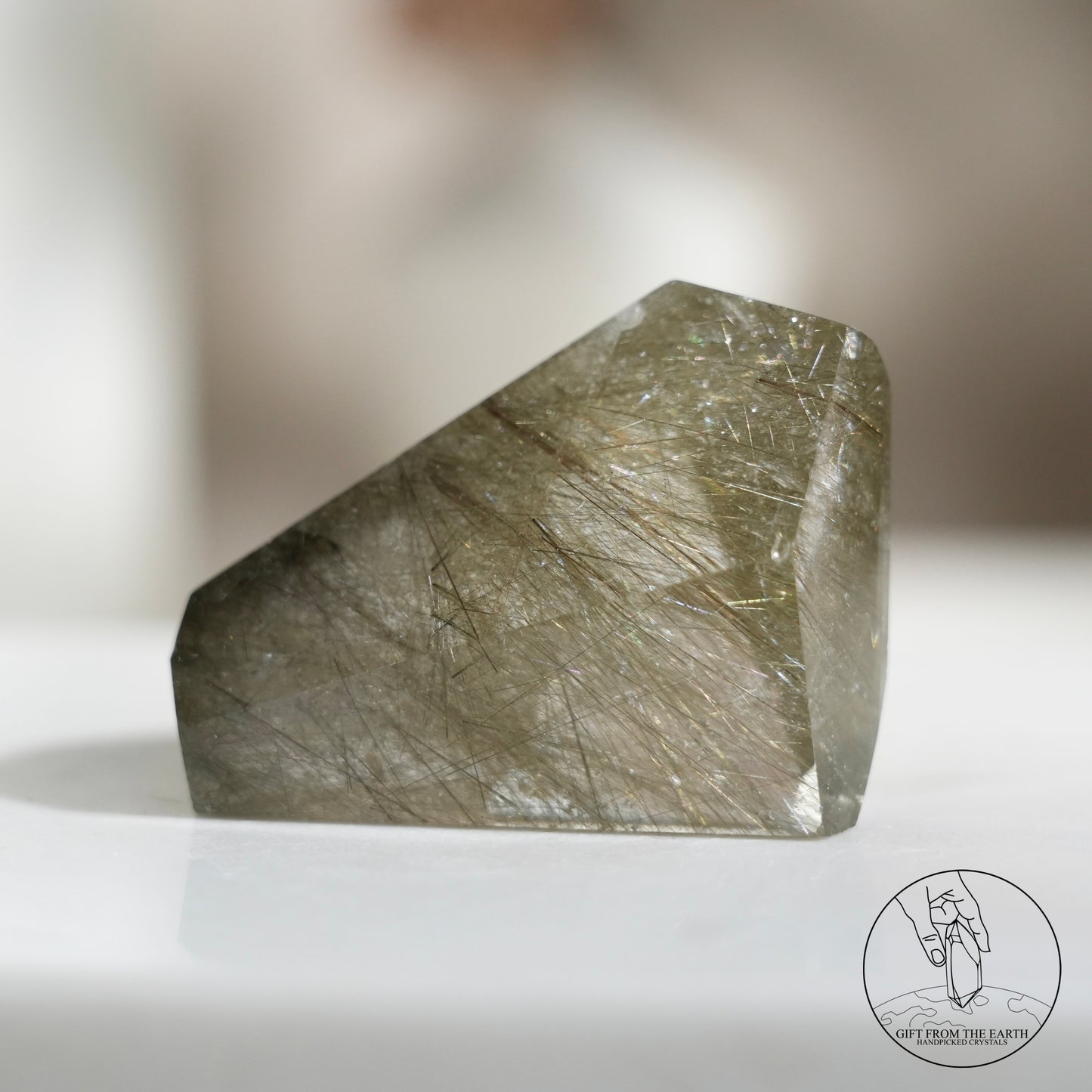 Green rutilated quartz sphere