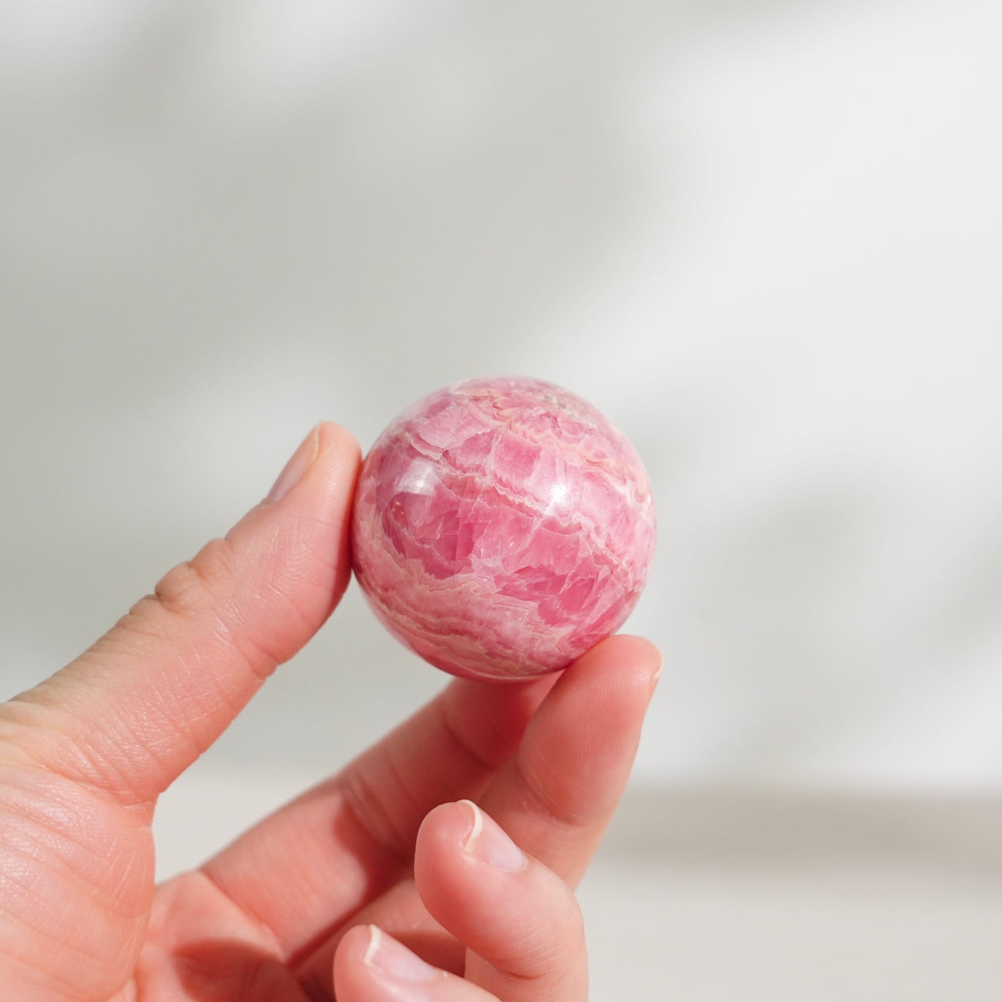 Peruvian rhodochrosite sphere