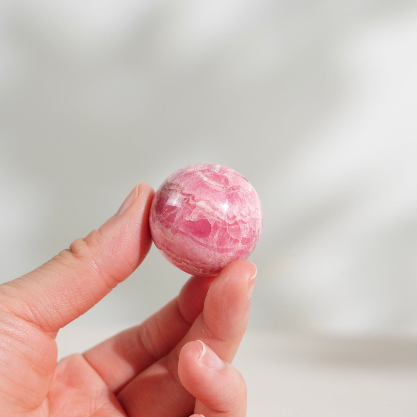 Peruvian rhodochrosite sphere