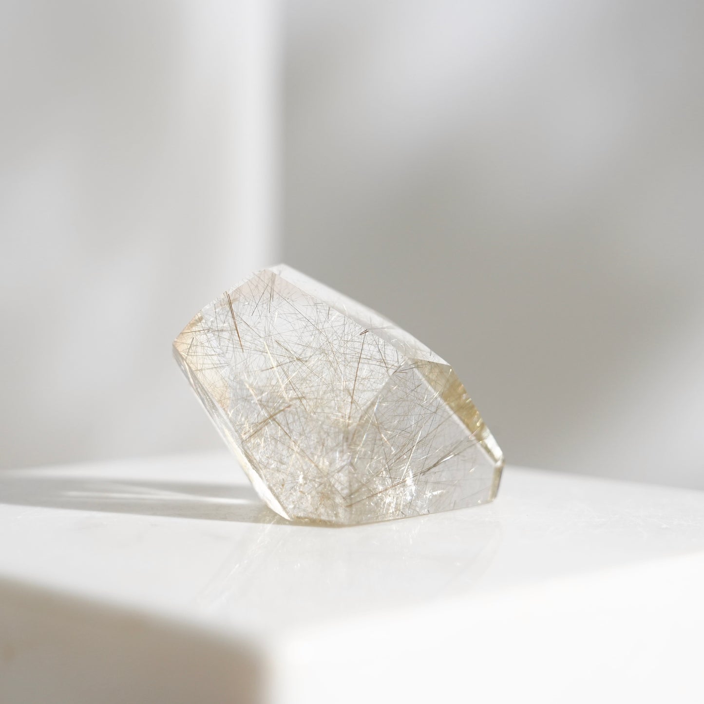 Green rutilated quartz sphere
