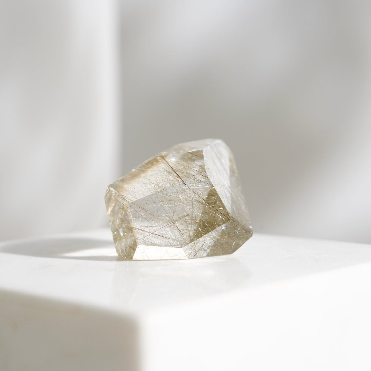 Green rutilated quartz sphere