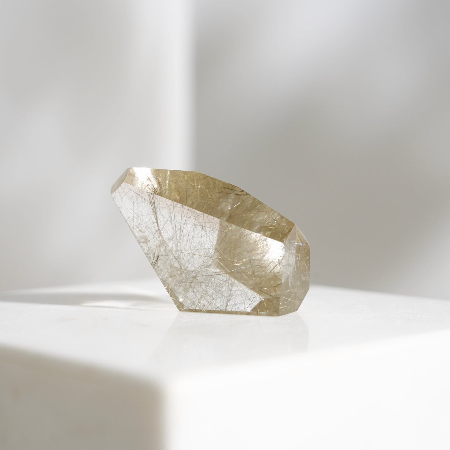 Green rutilated quartz sphere