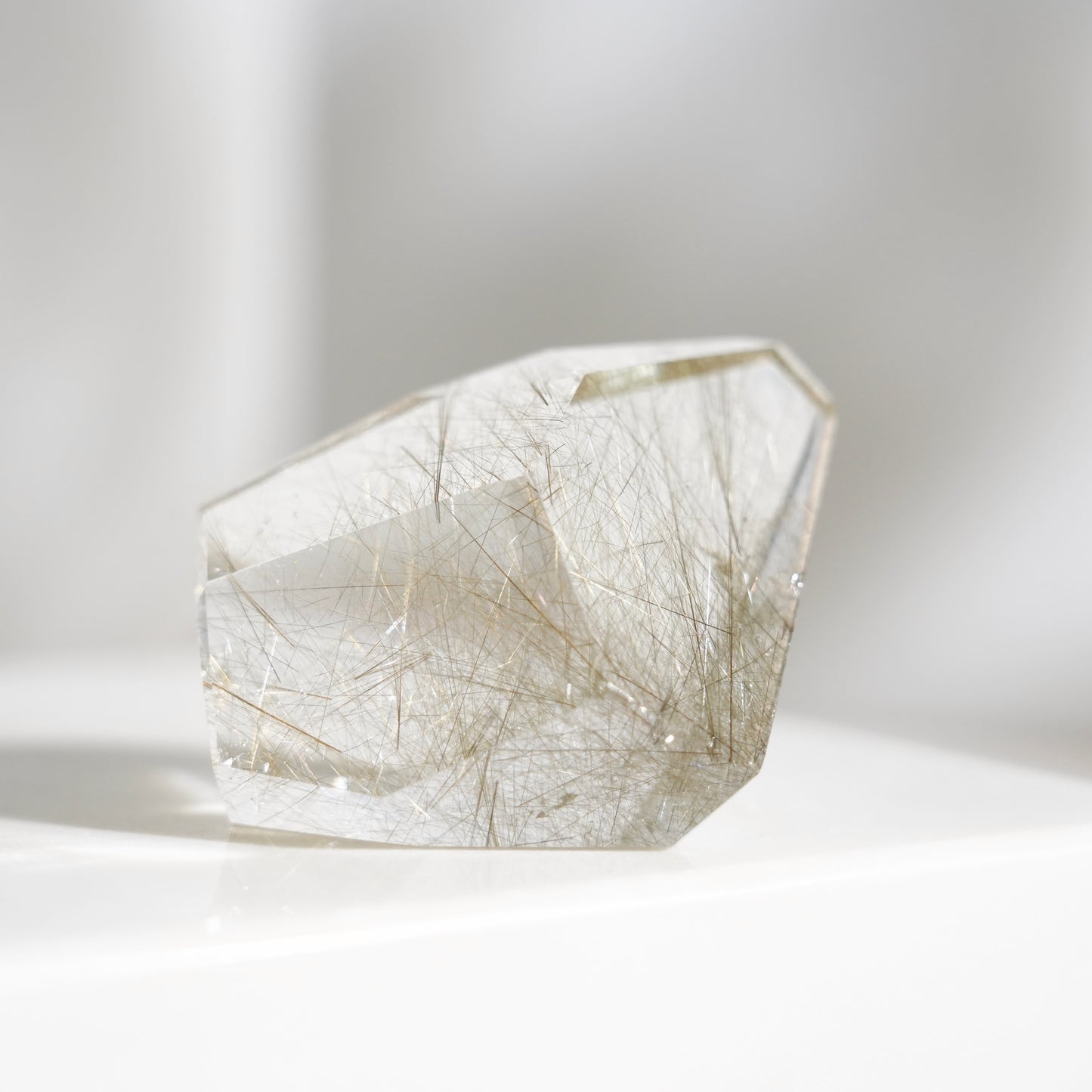 Green rutilated quartz sphere