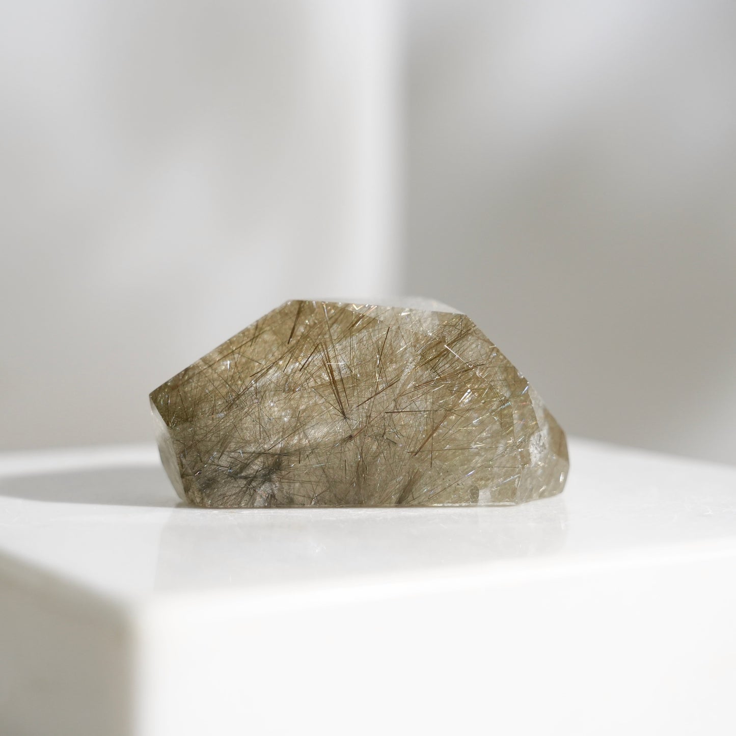 Green rutilated quartz sphere