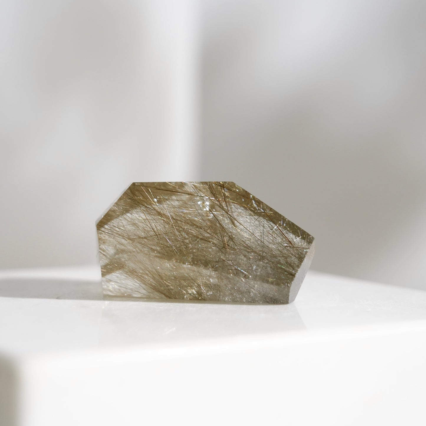 Green rutilated quartz sphere
