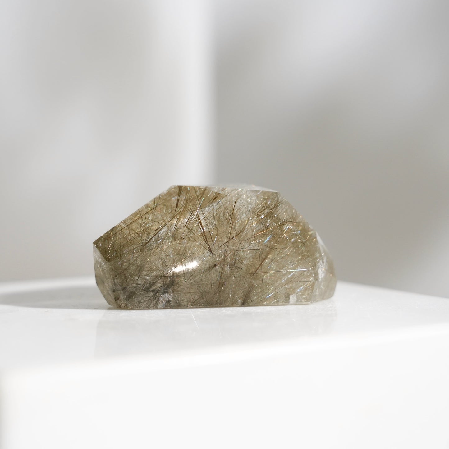 Green rutilated quartz sphere