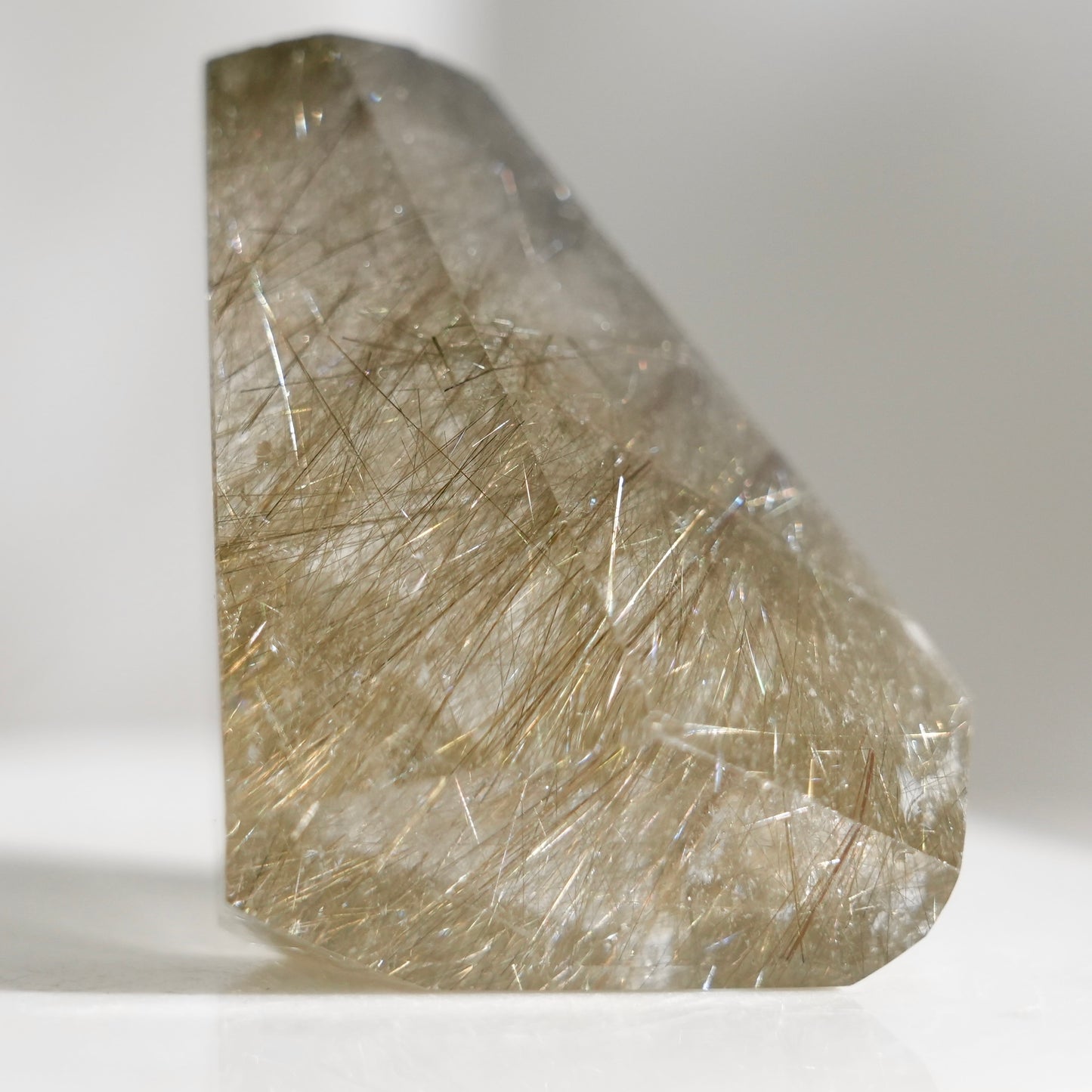 Green rutilated quartz sphere